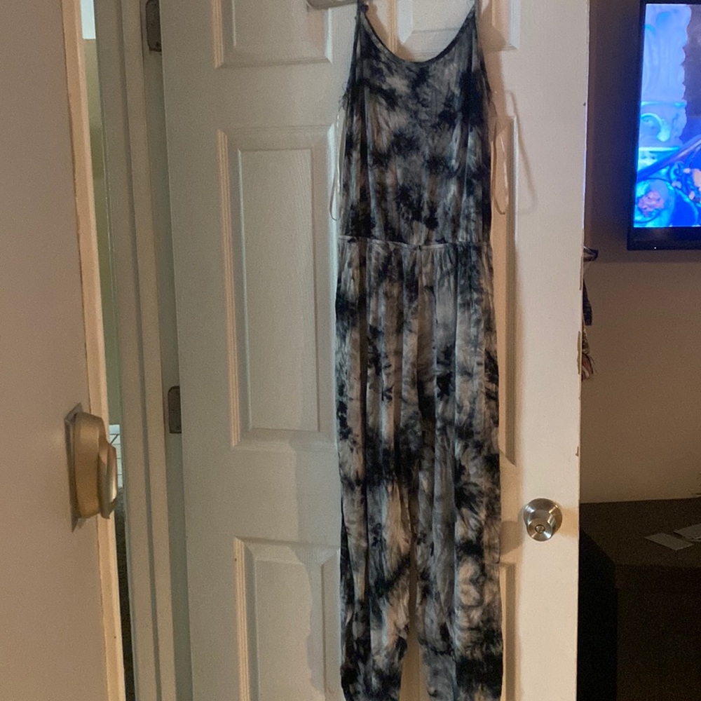 Spaghetti Strap jumpsuit with slits on the side.